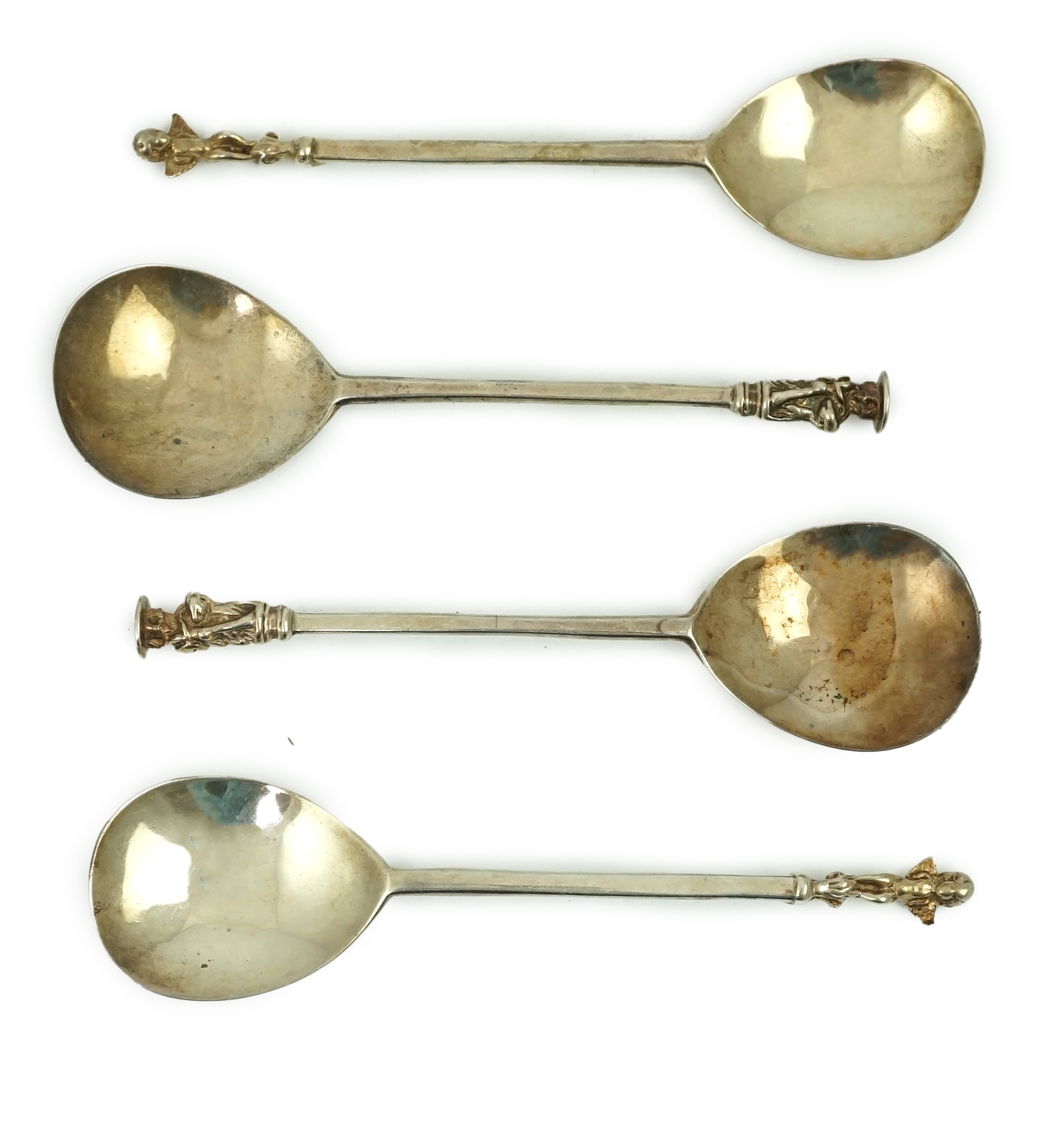 Four cased 18th century silver spoons